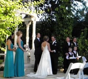 Jamie Eastgate, Civil Marriage Celebrant performing a wedding at Boulevard Gardens, Indooroopilly