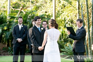Brisbane Celebrant Jamie Eastgate performing a wedding at Mt Coot-tha Botanic Gardens, Wedding Lawn 1: Palm Tree Lawn. Image: Milque Photography